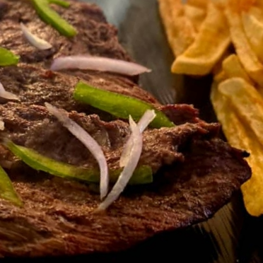 Filet de bœuf braisé au charbon de bois